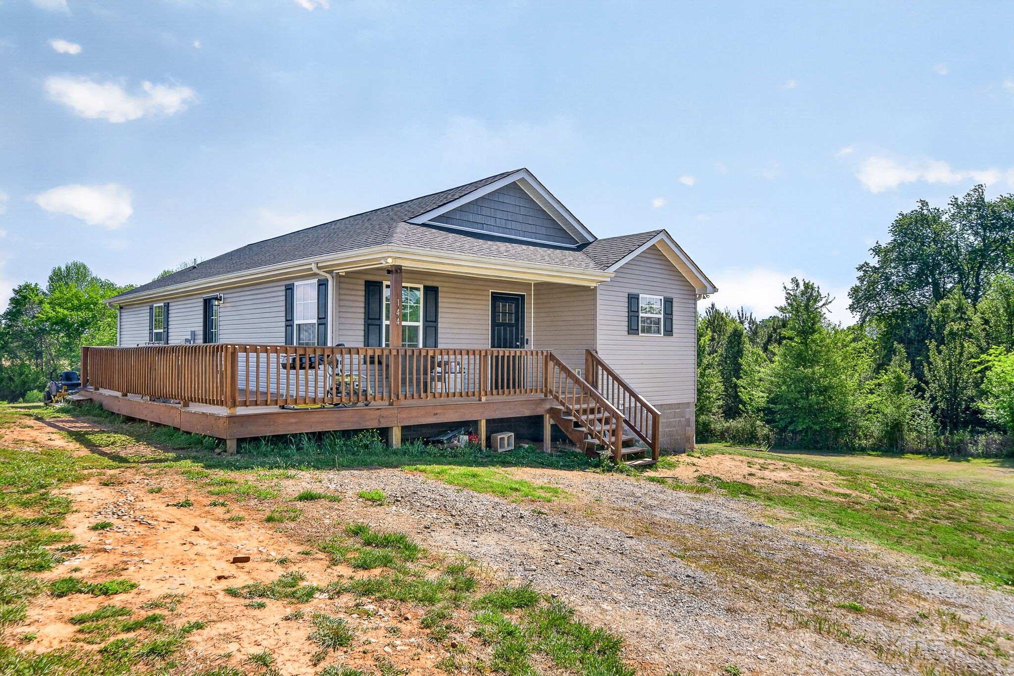 144 Liberty Road Sparta, TN 38583 - Photo 21 of 24 a view of a house with big yard and large tree