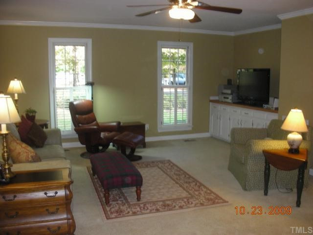 11805 Old Creedmoor Road Raleigh, NC 27613 - Photo 7 of 12 Another View of The Family Room. This View Showcases the Custom 8' Built-In Entertainment Center. Den/Family/Great Room
