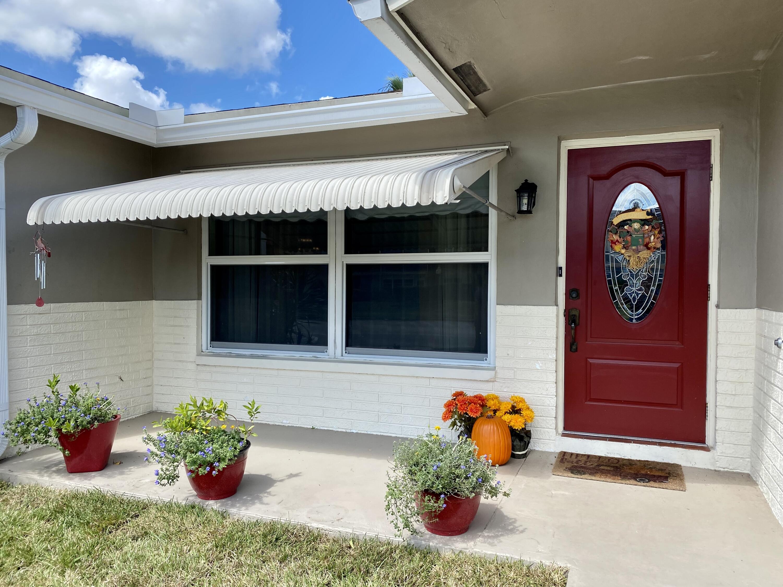 9283 Southwest 3rd Street Boca Raton, FL 33428 - Photo 30 of 33 Impact Front Door