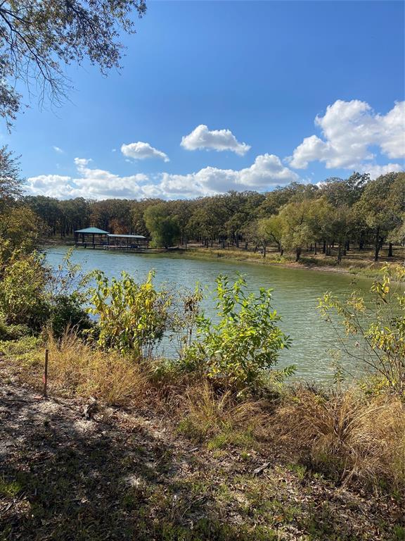 Tbd Nautical Drive Quinlan, TX 75474 - Photo 5 of 14 a view of a lake with a mountain