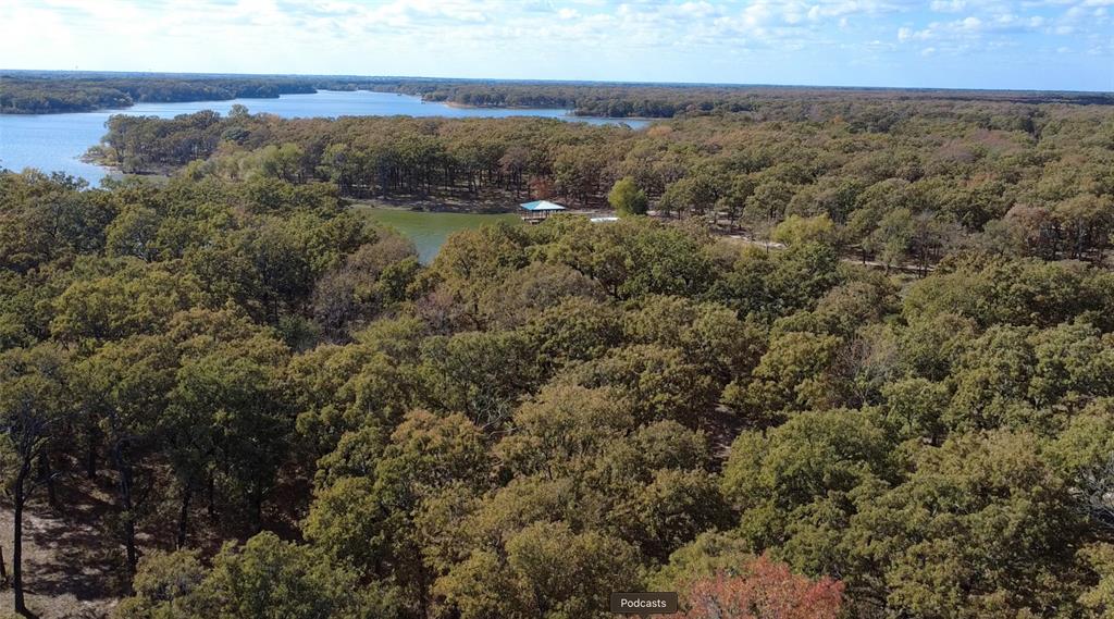 Tbd Nautical Drive Quinlan, TX 75474 - Photo 7 of 14 an aerial view of residential houses with outdoor space and trees