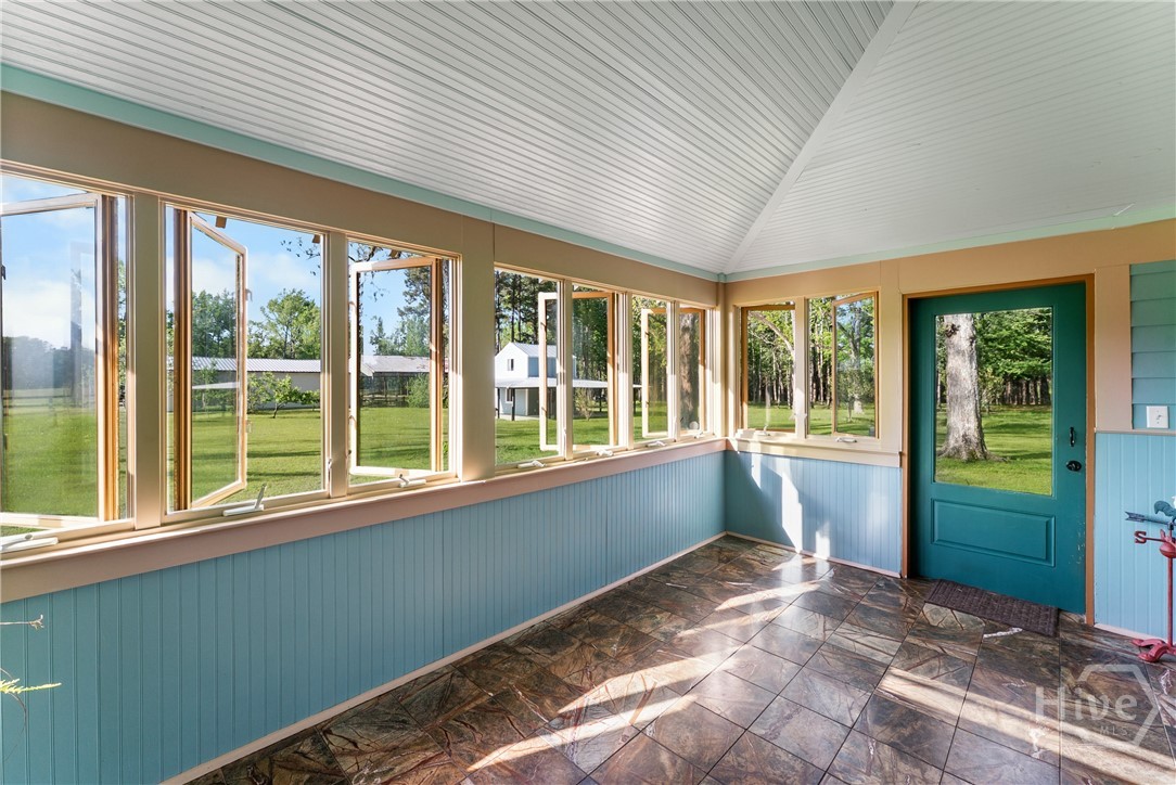 1151 Harry Lindsay Road Guyton, GA 31312 - Photo 43 of 66 SUNROOM MAIN HOUSE