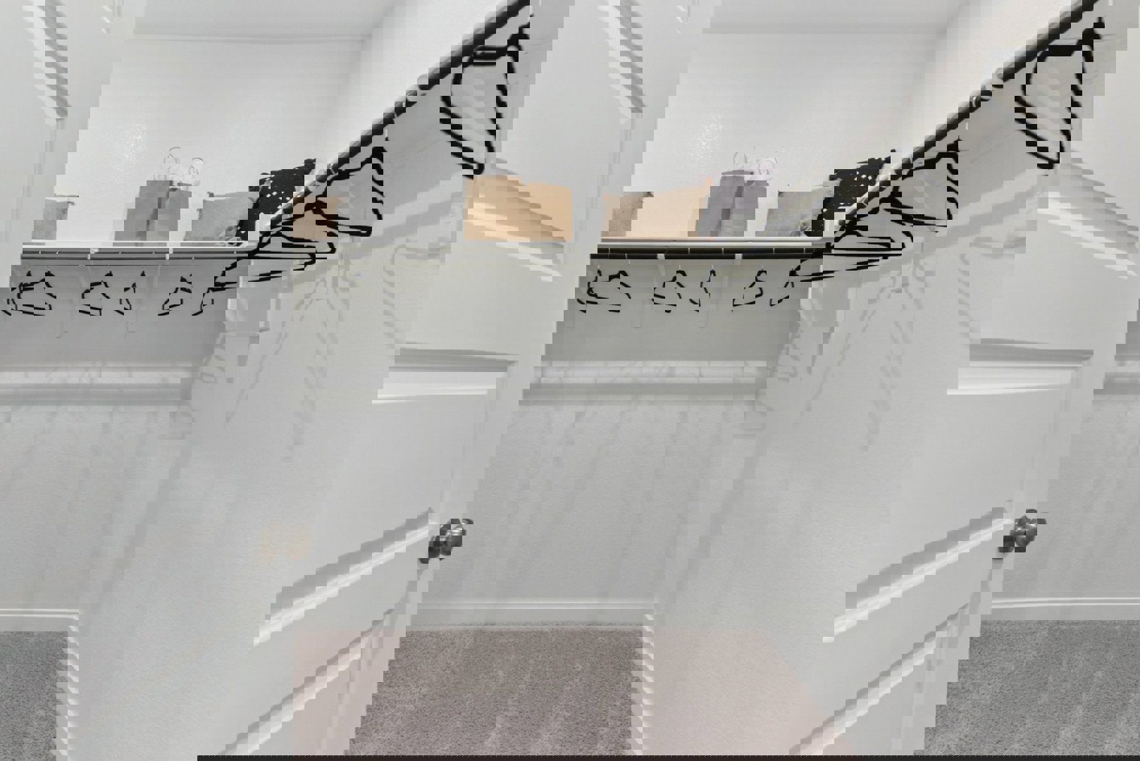 10601 Justify Lane Buda, TX 78610 - Photo 9 of 20 a view of a room with racks on the wall