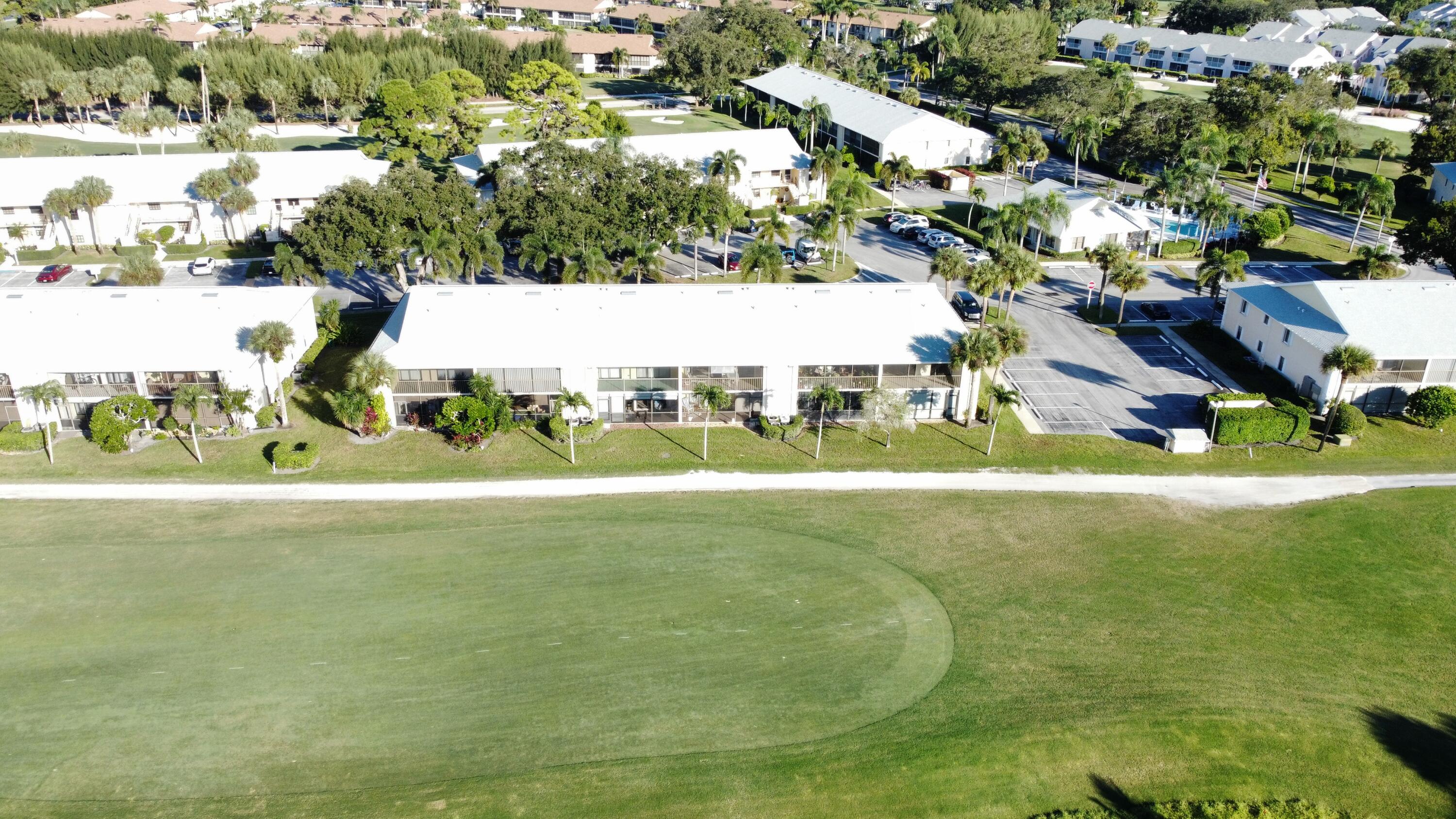 1072 Keystone Drive, Unit A Jupiter, FL 33458 - Photo 24 of 29 a view of a big yard