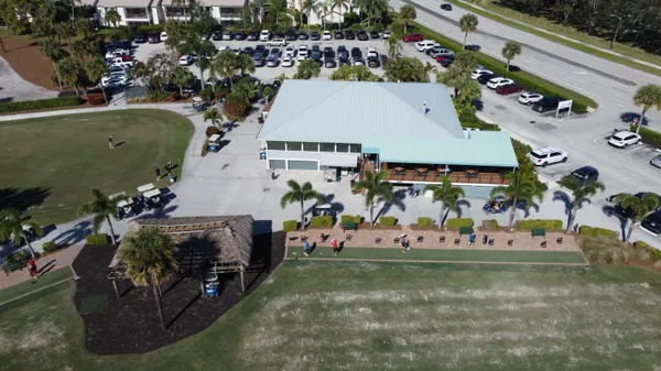 an aerial view of a house with a garden