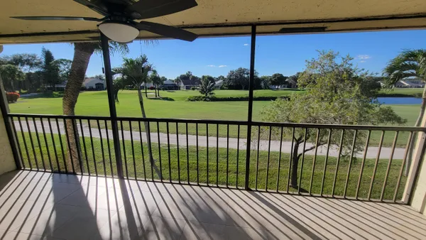 a view of a balcony with a garden