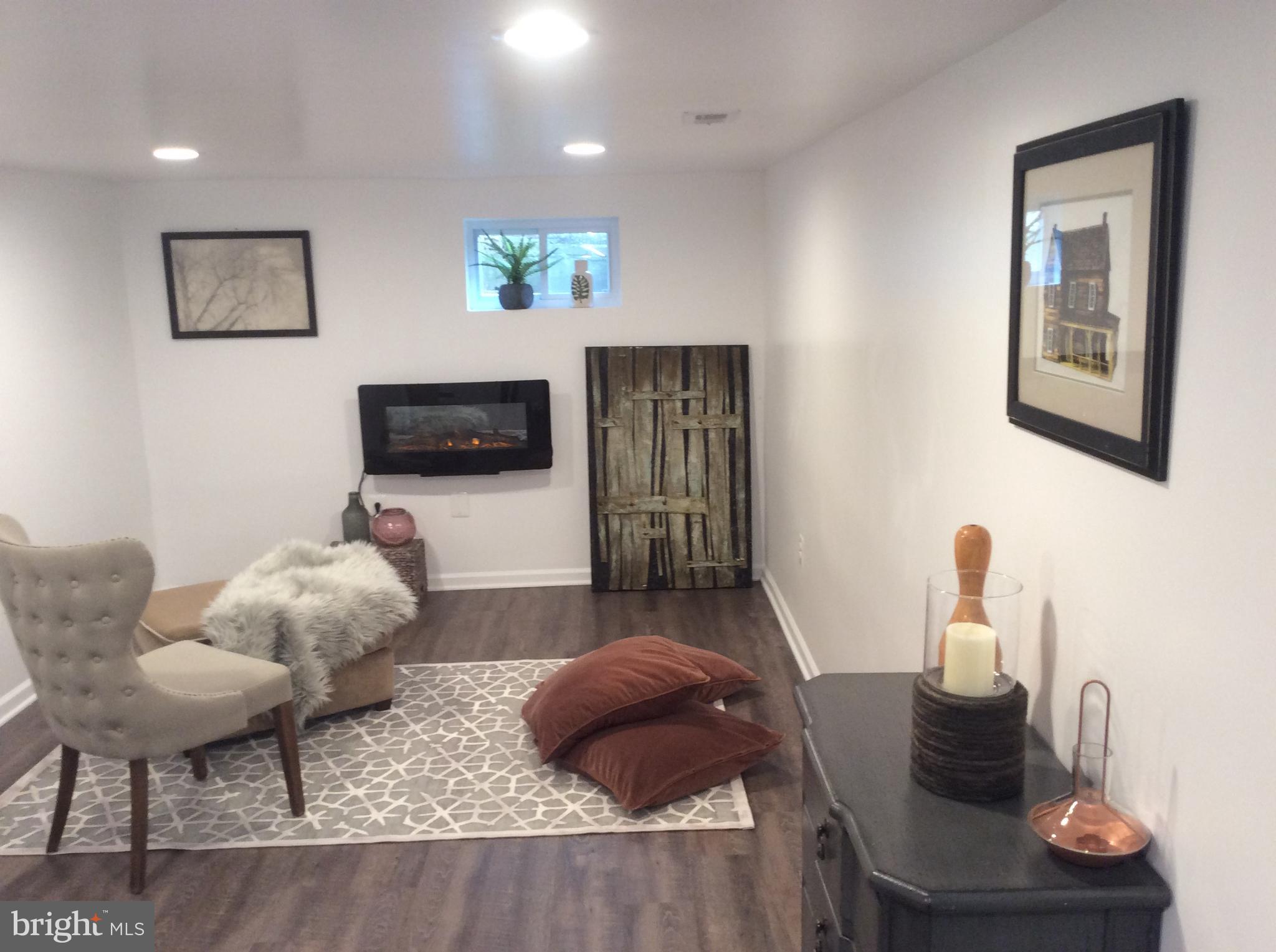 9326 Decatur Place Laurel, MD 20723 - Photo 26 of 26 Cozy basement living area