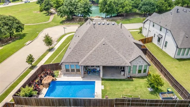 swimming pool view with a outdoor seating