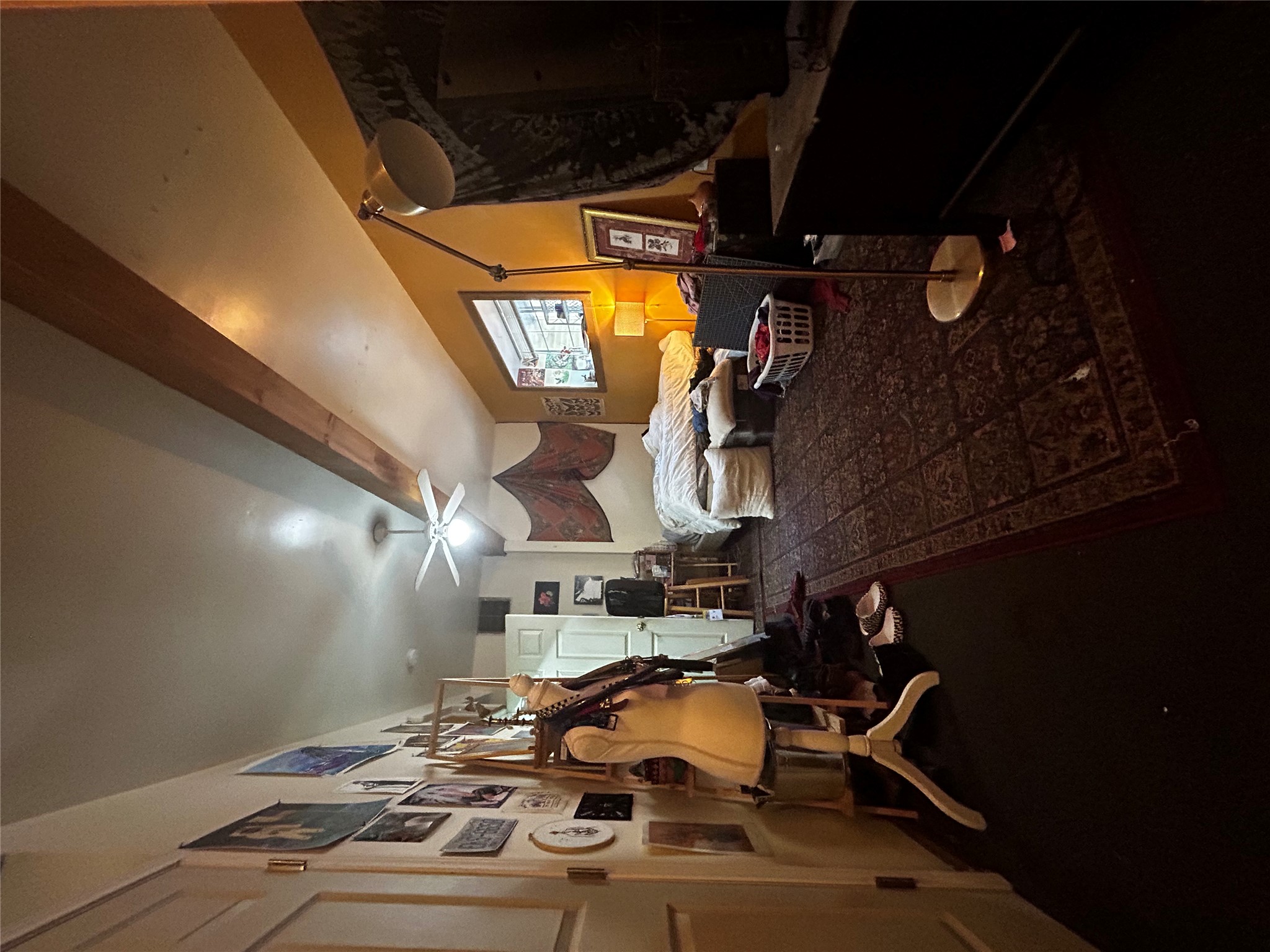 4511 B Avenue, Unit B Austin, TX 78751 - Photo 11 of 30 a living room with furniture a flat screen tv and gym equipment