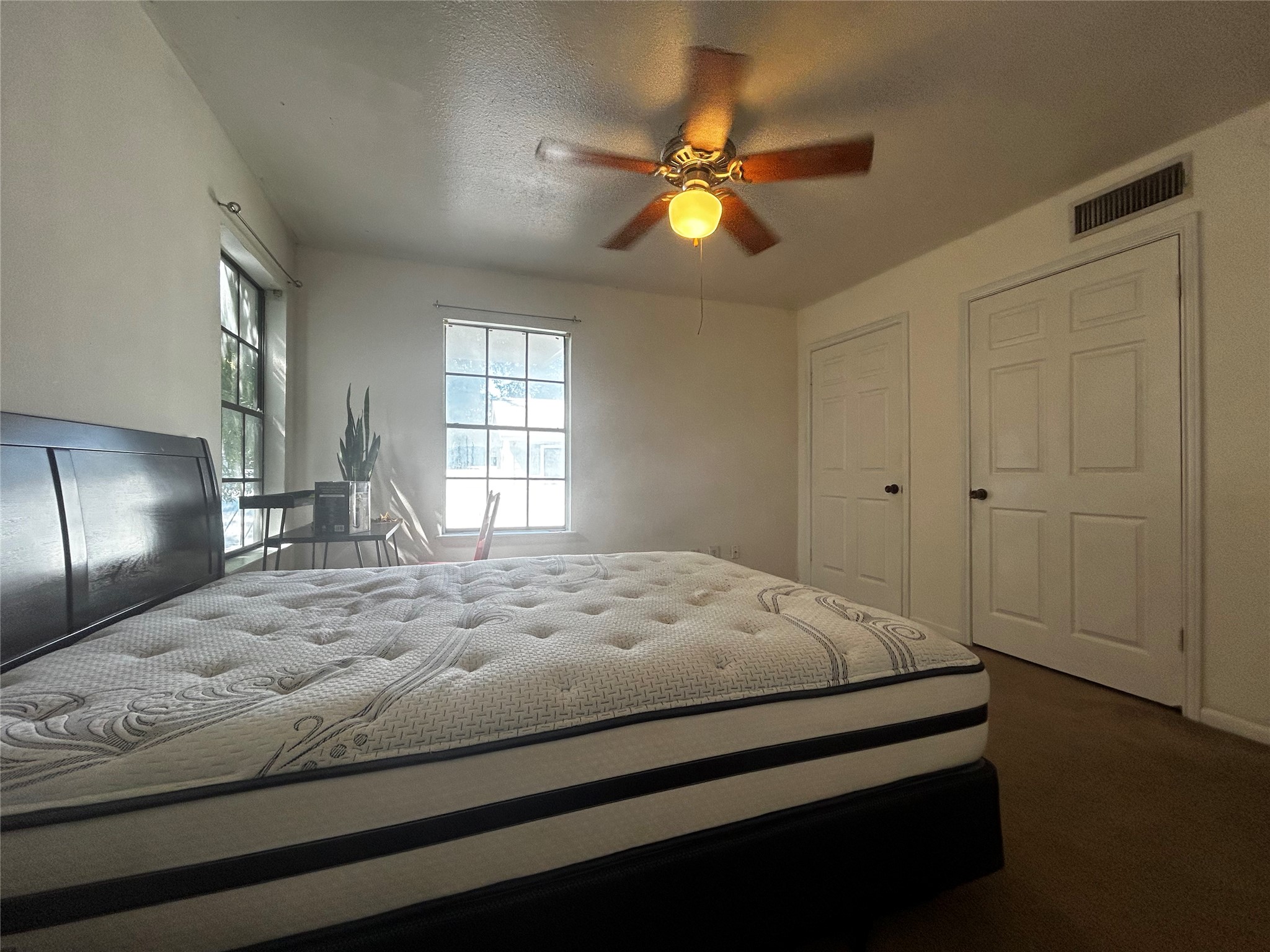 4511 B Avenue, Unit B Austin, TX 78751 - Photo 15 of 30 a bedroom with a bed and window