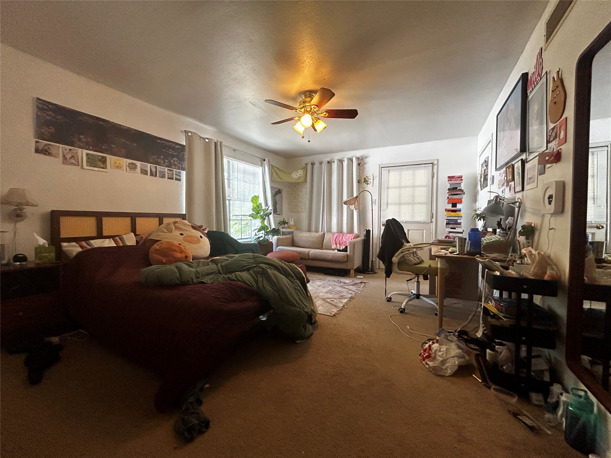 4511 B Avenue, Unit B Austin, TX 78751 - Photo 16 of 30 a bed room with a bed furniture and a chandelier