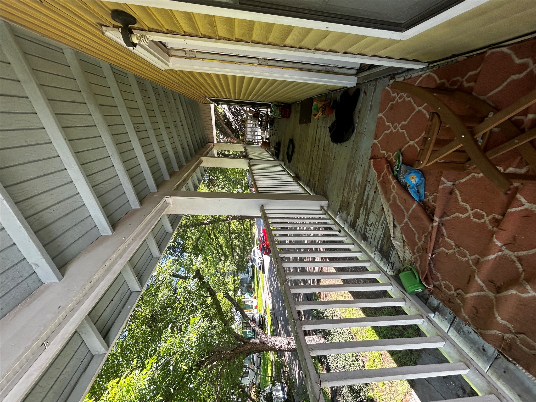 4511 B Avenue, Unit B Austin, TX 78751 - Photo 17 of 30 a view of balcony with wooden floor