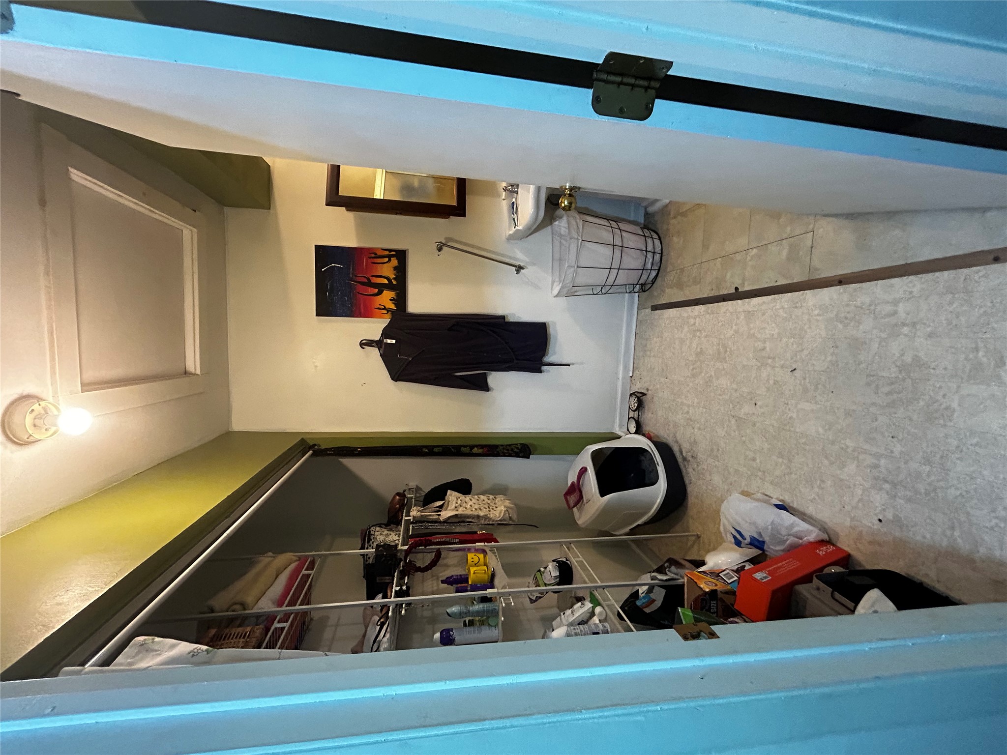 4511 B Avenue, Unit B Austin, TX 78751 - Photo 8 of 30 a view of walk in closet with clothes and shoes