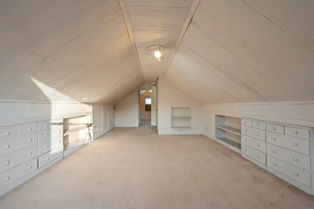 a view of a hallway with staircase