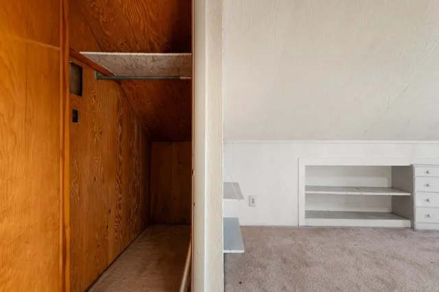 a view of an empty walk in closet