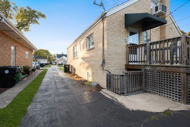 a house view with a garden space