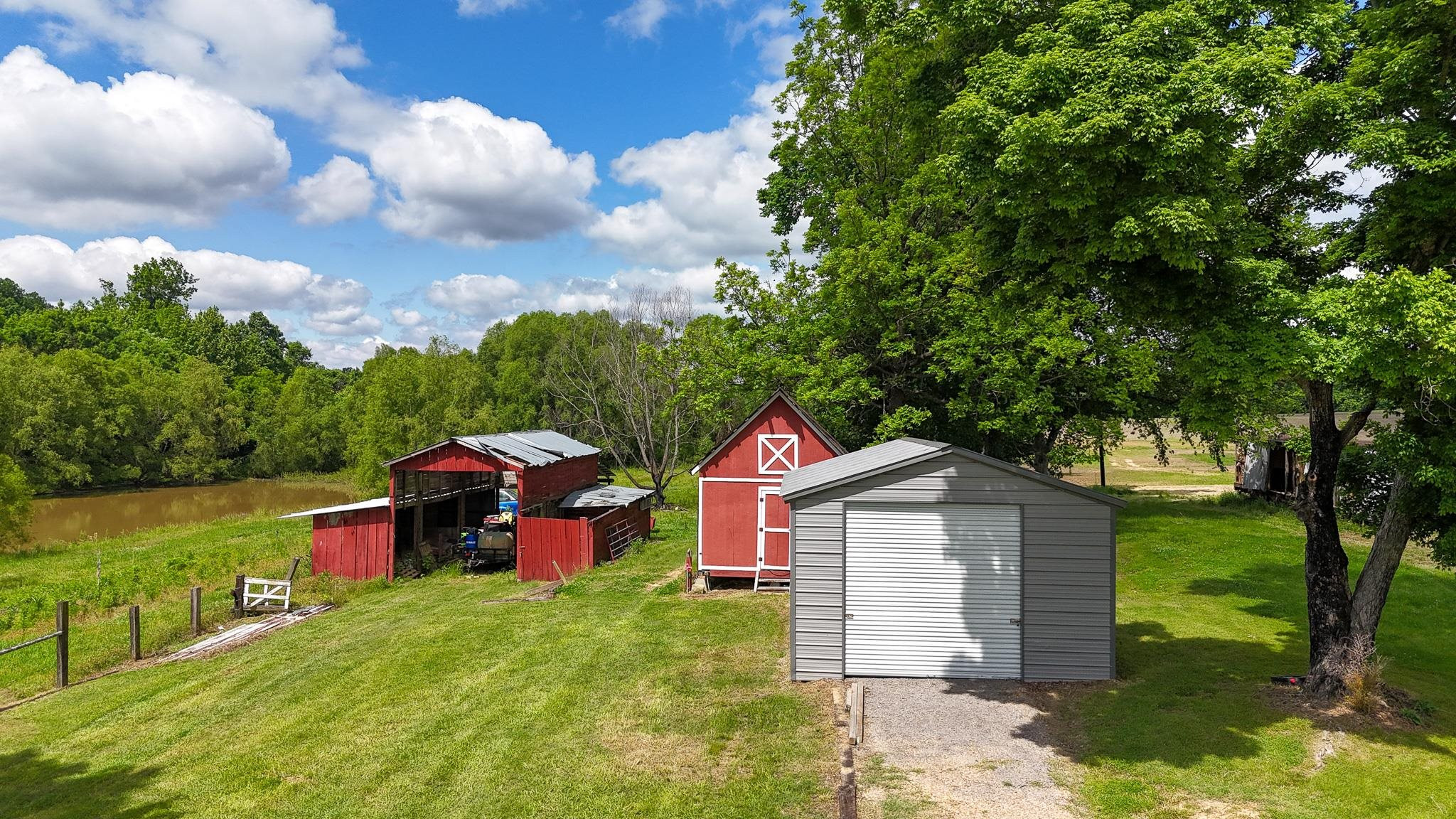 2390 Dr Lewis Road Ripley, TN 38063 - Photo 12 of 48 a view of a wooden house with a yard