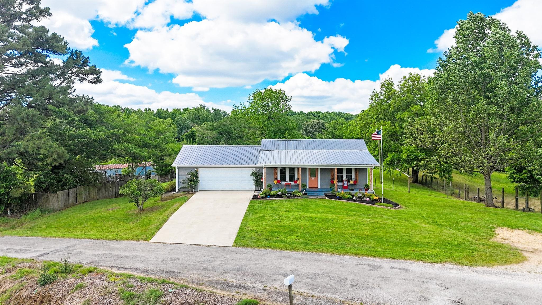 2390 Dr Lewis Road Ripley, TN 38063 - Photo 8 of 48 a front view of a house with garden