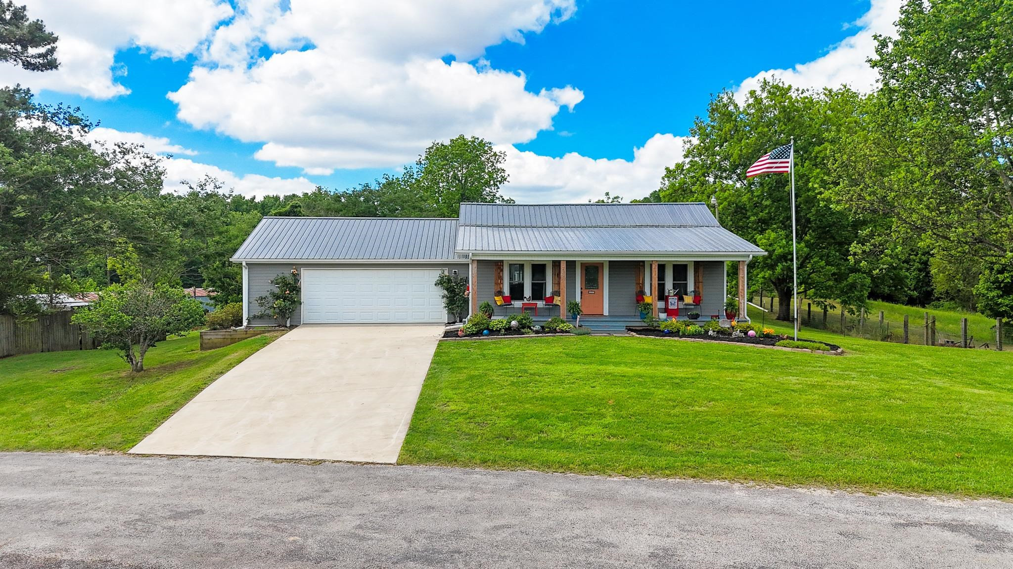 2390 Dr Lewis Road Ripley, TN 38063 - Photo 10 of 48 front view of a house with a yard