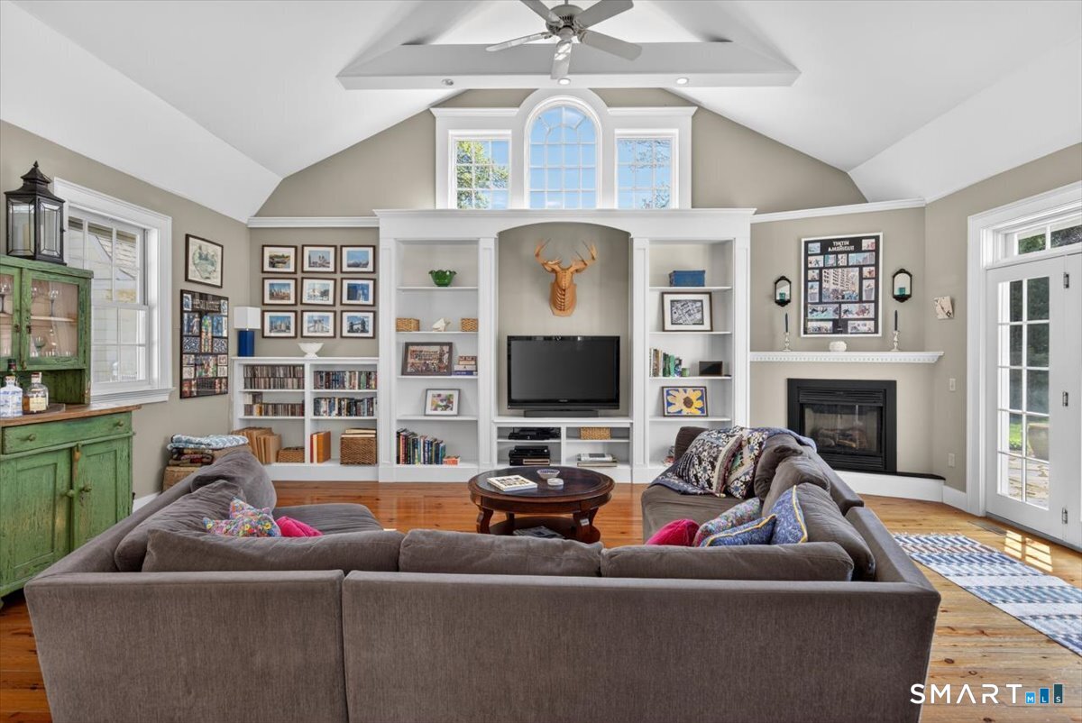1795 Whitney Avenue Hamden, CT 06517 - Photo 11 of 40 with lovely built-ins and gas fireplace