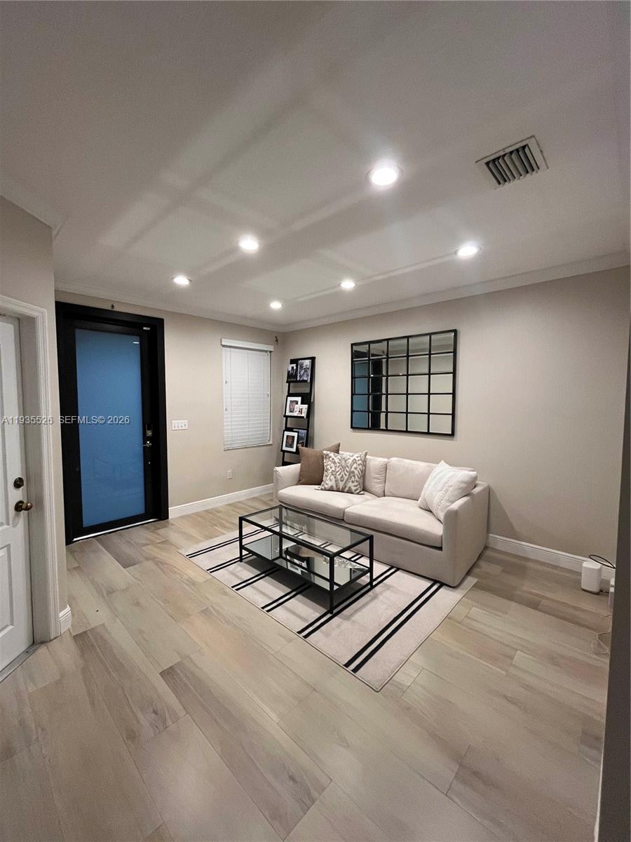 10872 Southwest 89th Street, Unit 10872 Miami, FL 33176 - Photo 24 of 25 a living room with furniture