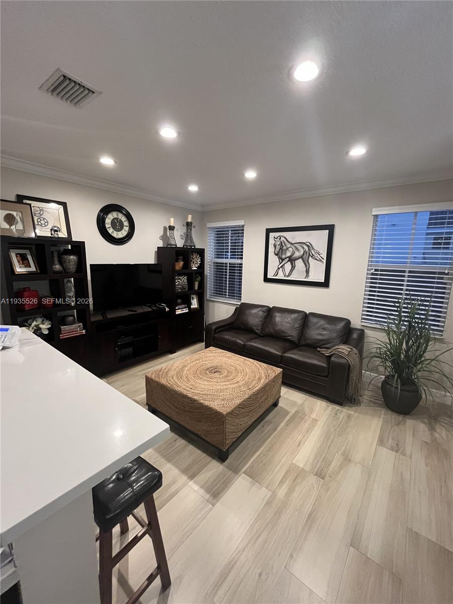 10872 Southwest 89th Street, Unit 10872 Miami, FL 33176 - Photo 4 of 25 a living room with furniture