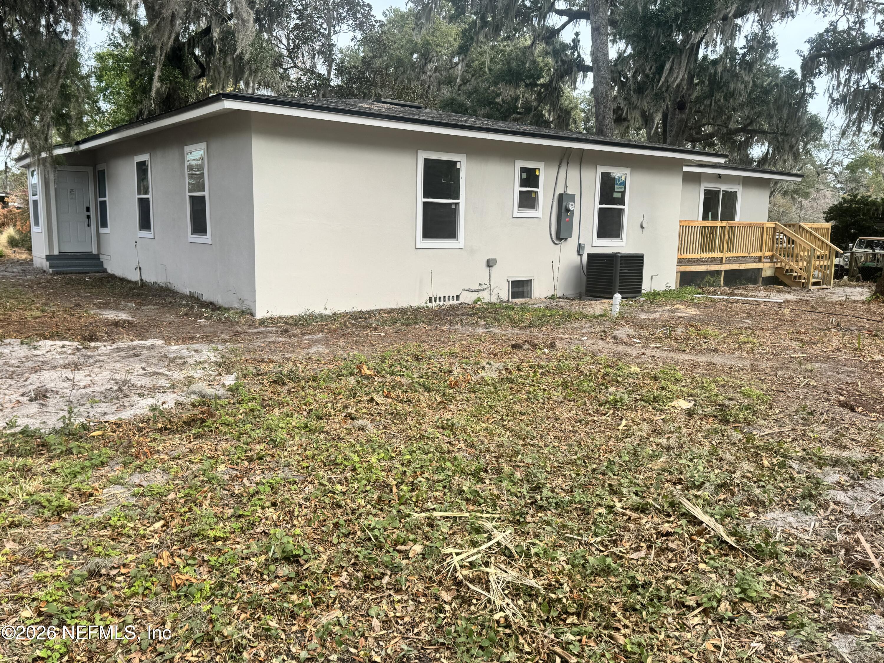 1718 Cornell Road Jacksonville, FL 32207 - Photo 8 of 41 a view of a house with a backyard