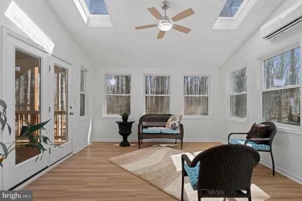 a view of entryway with livingroom and furniture