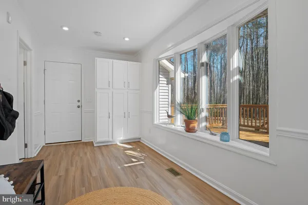 a view of a bedroom with a bed