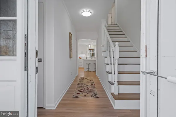 a view of a livingroom with wooden floor