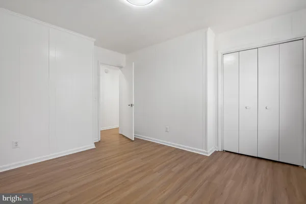 a view of a room with wooden walls
