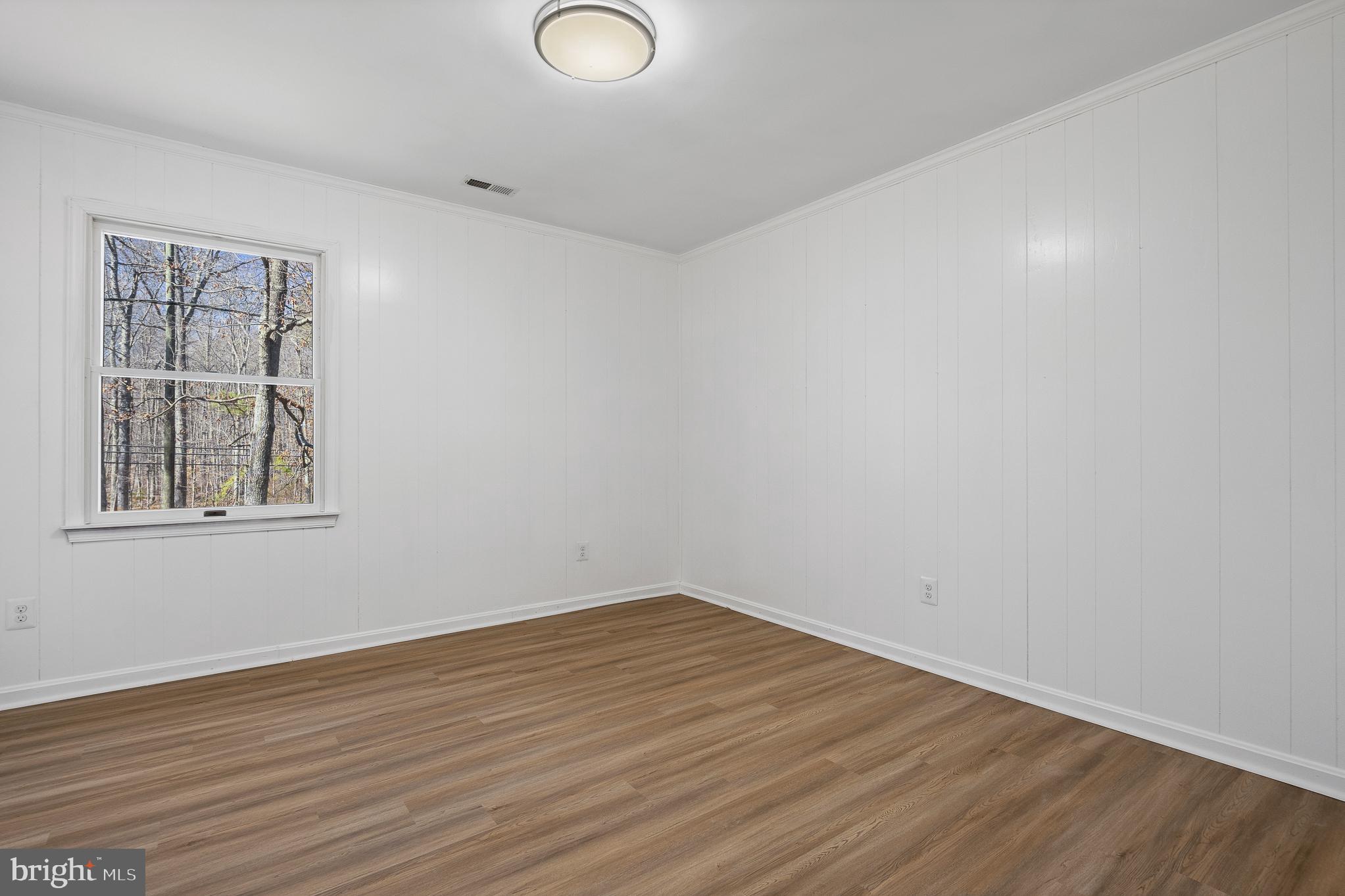 5235 Chalk Point Road West River, MD 20778 - Photo 48 of 69 wooden floor in an empty room