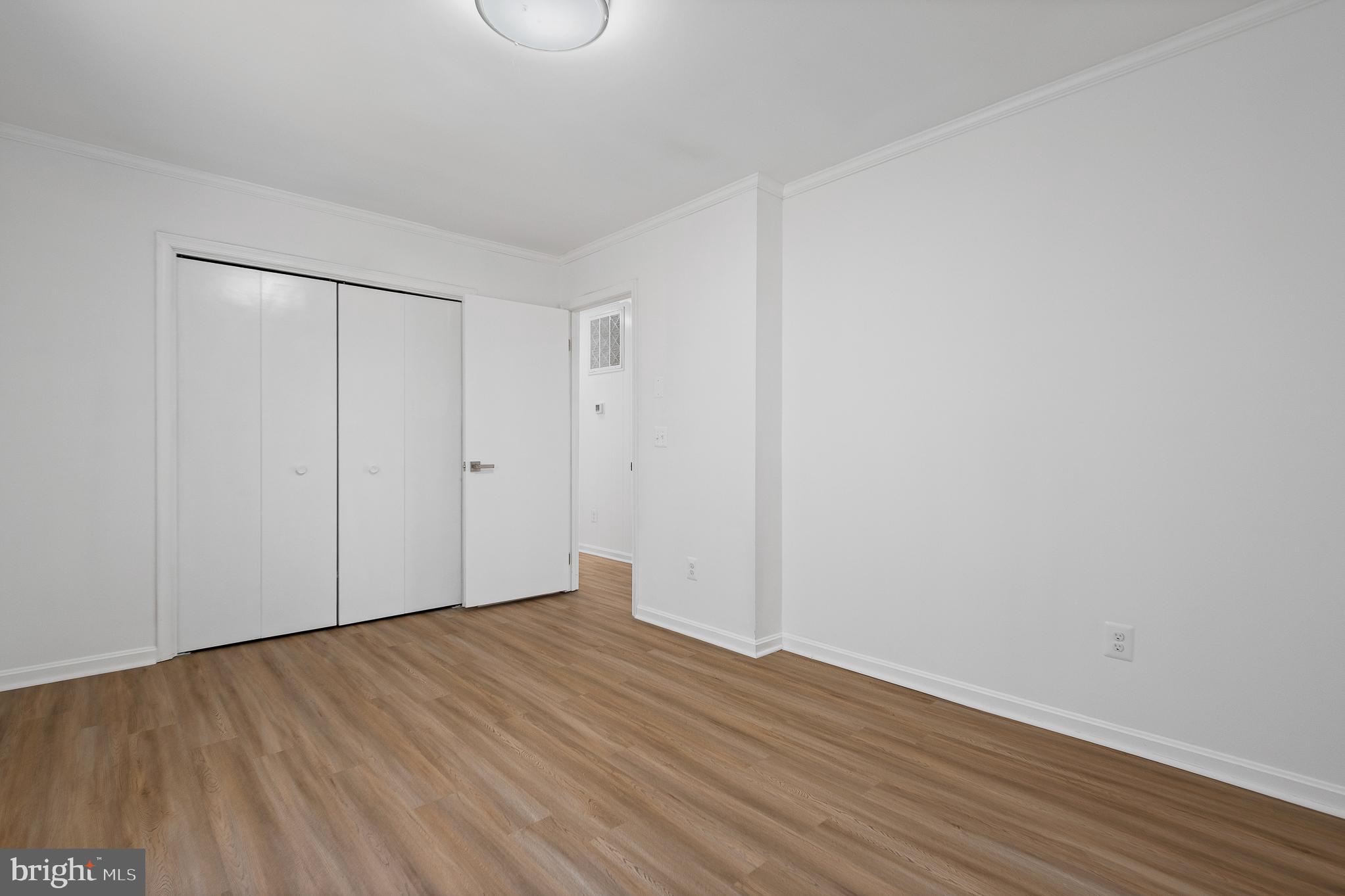 5235 Chalk Point Road West River, MD 20778 - Photo 49 of 69 a view of an empty room with wooden floor