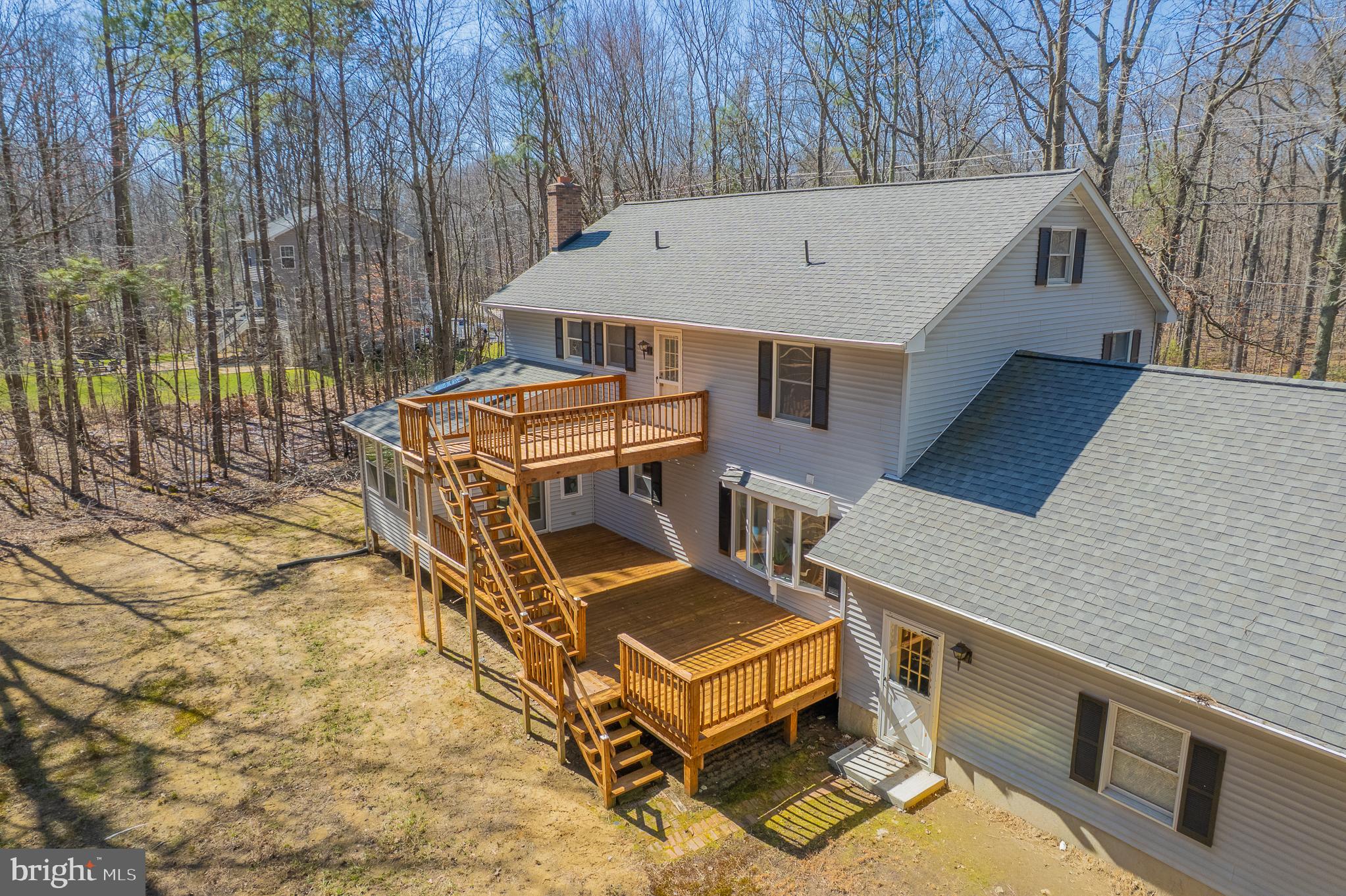 5235 Chalk Point Road West River, MD 20778 - Photo 59 of 69 an aerial view of a house with backyard space and balcony