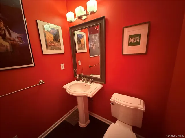 a bathroom with a double vanity sink a and mirror