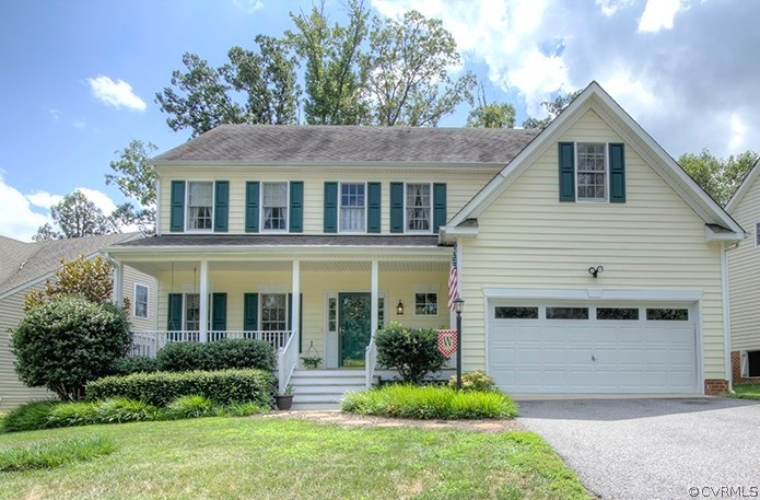 707 Biggin Pond Road Midlothian, VA 23114 - Photo 1 of 36 a front view of a house with a yard and porch