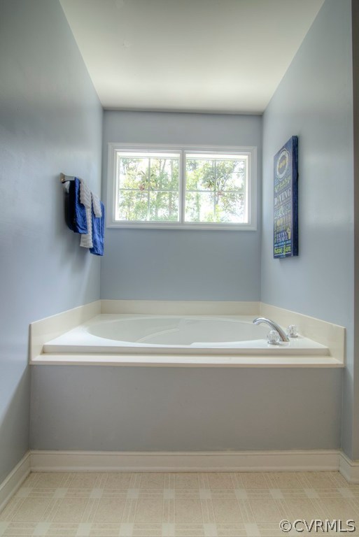 707 Biggin Pond Road Midlothian, VA 23114 - Photo 27 of 36 a bathroom with a bathtub