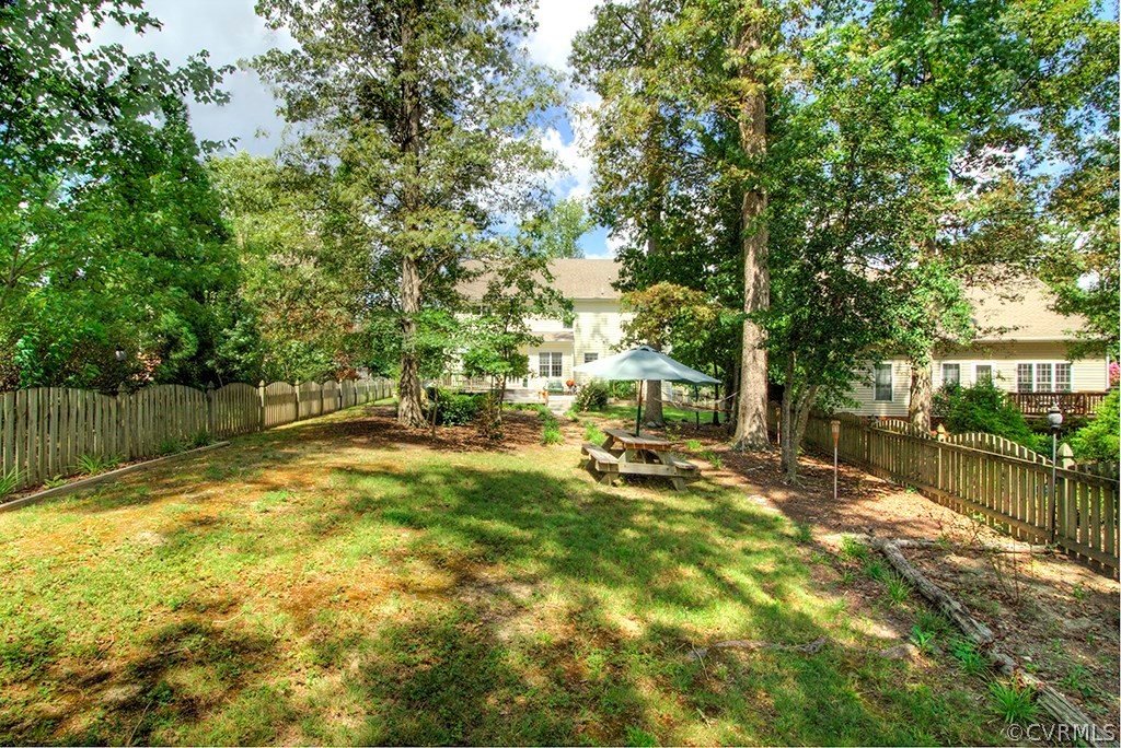 707 Biggin Pond Road Midlothian, VA 23114 - Photo 34 of 36 a view of swimming pool with a patio