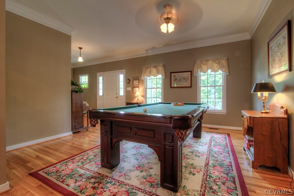707 Biggin Pond Road Midlothian, VA 23114 - Photo 7 of 36 a room with furniture pool table and windows