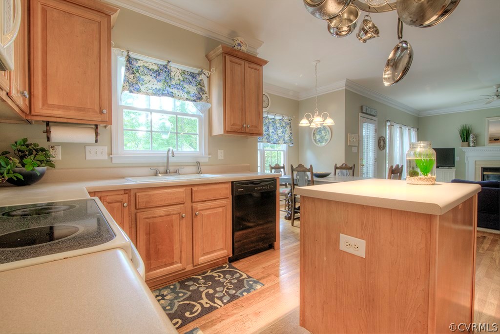 707 Biggin Pond Road Midlothian, VA 23114 - Photo 9 of 36 a kitchen that has a sink and a stove in it