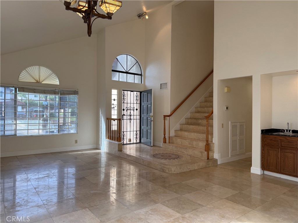 2421 Mangular Avenue Corona, CA 92882 - Photo 10 of 25 a view of an entryway with wooden floor