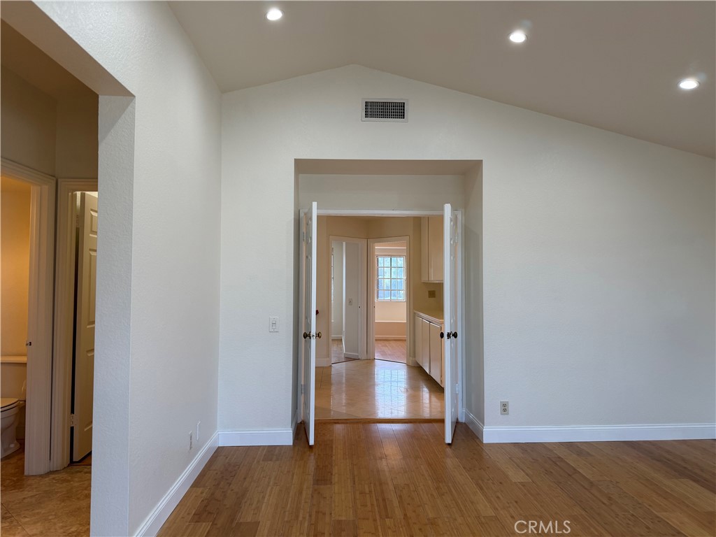 2421 Mangular Avenue Corona, CA 92882 - Photo 18 of 25 Master Bedroom look out to hall and other rooms