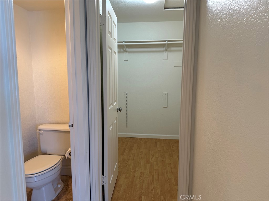 2421 Mangular Avenue Corona, CA 92882 - Photo 22 of 25 Walk in Closet in master bedroom