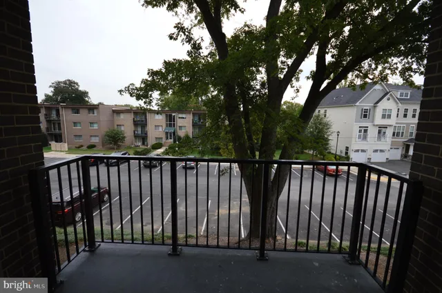a view of outdoor space with deck and trees