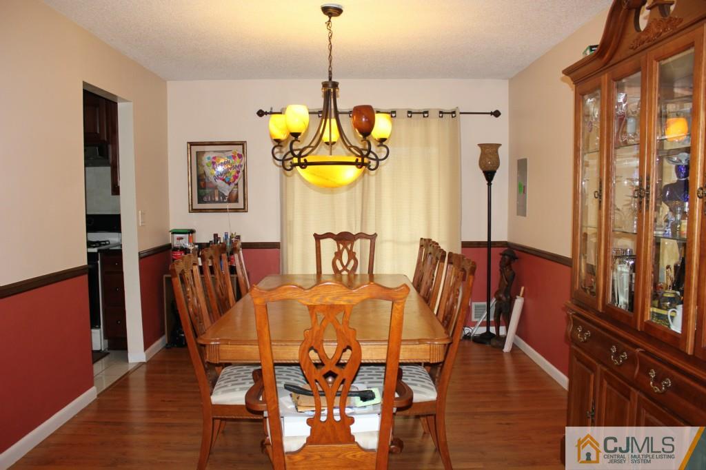 5205 Hana Road Edison, NJ 08817 - Photo 5 of 15 a dining room with furniture and window