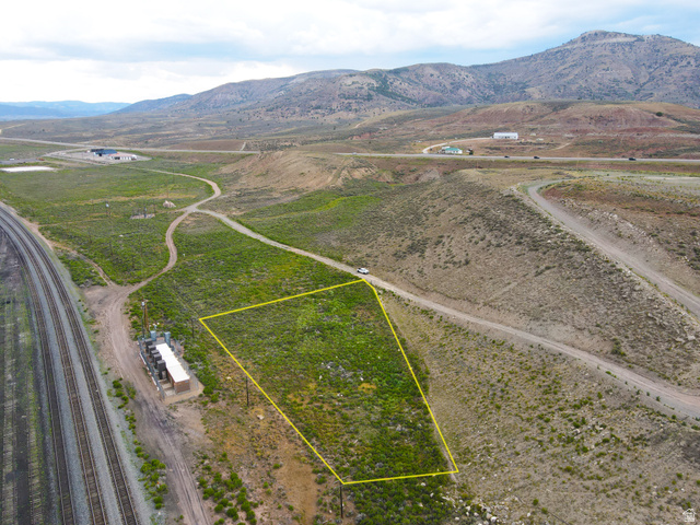 25315 South UDOT Access Road East Helper, UT 84526 - Photo 6 of 20 Expansive land parcel outlined in yellow, featuring varied terrain and natural vegetation