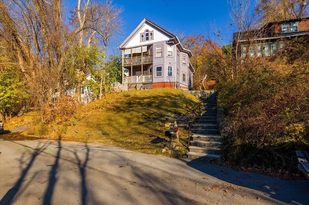 1550-1552 Main Street Worcester, MA 01603 - Photo 1 of 34 a view of a house with a yard