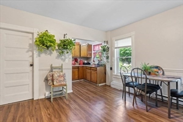 1550-1552 Main Street Worcester, MA 01603 - Photo 15 of 34 a living room with furniture and a potted plant