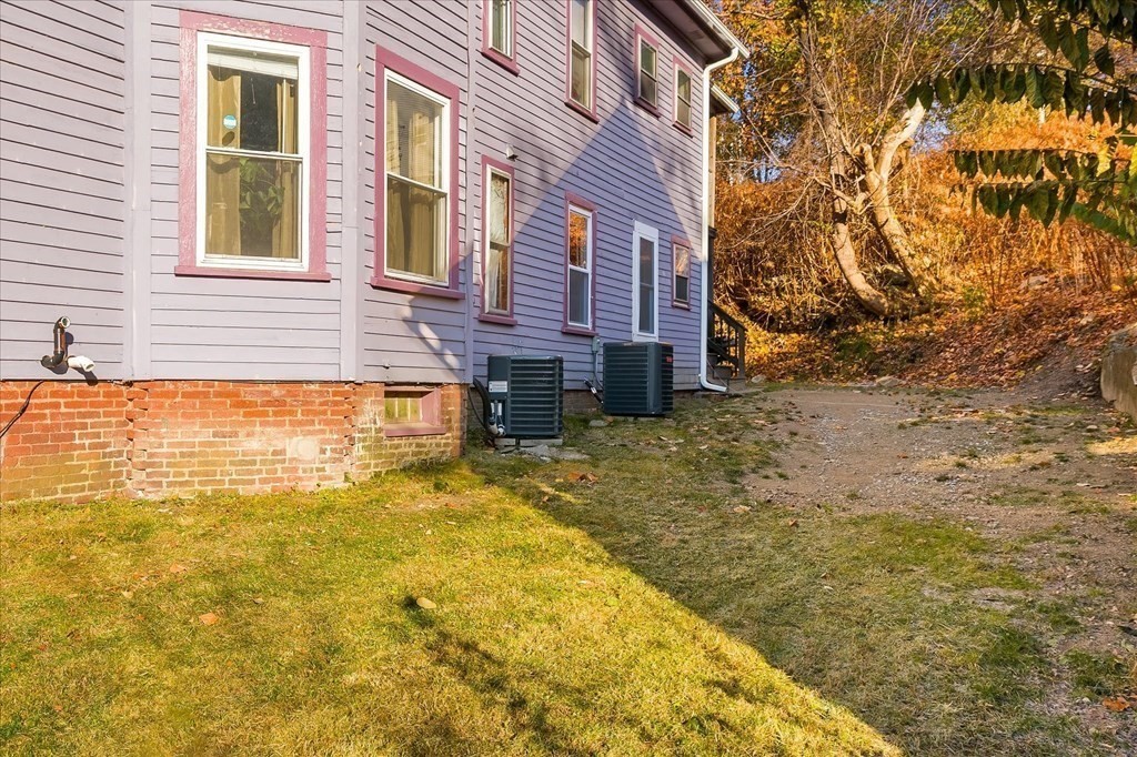 1550-1552 Main Street Worcester, MA 01603 - Photo 4 of 34 a view of residential house with swimming pool
