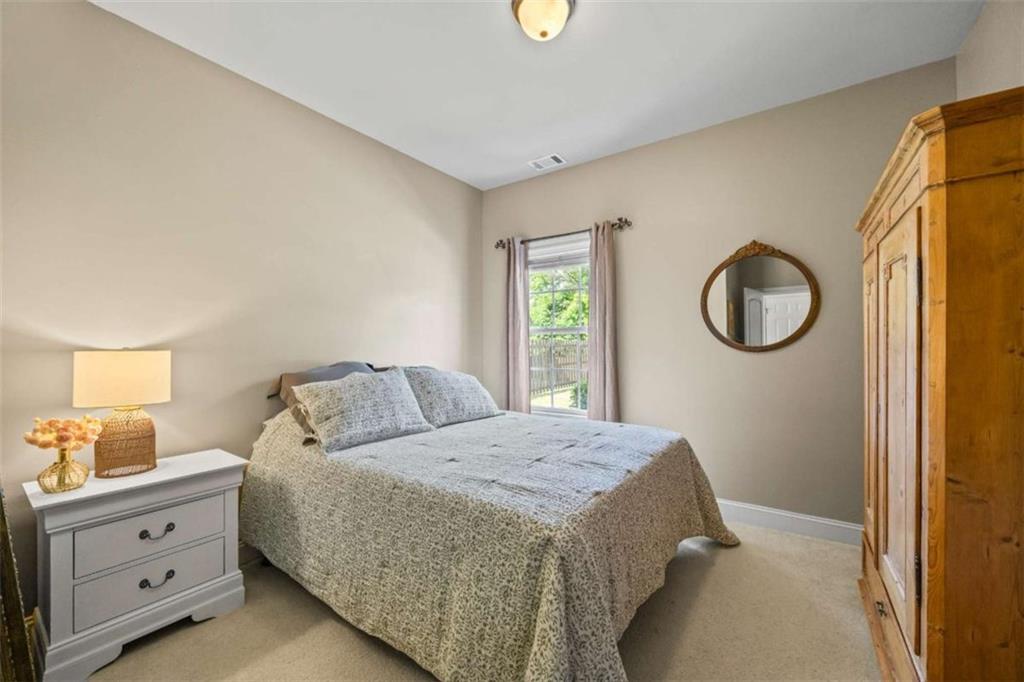 42 Pintail Lane Jefferson, GA 30549 - Photo 13 of 42 a bedroom with a bed and a window